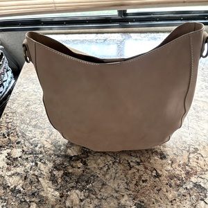 Universal thread purse. Tan color. Inside pocket